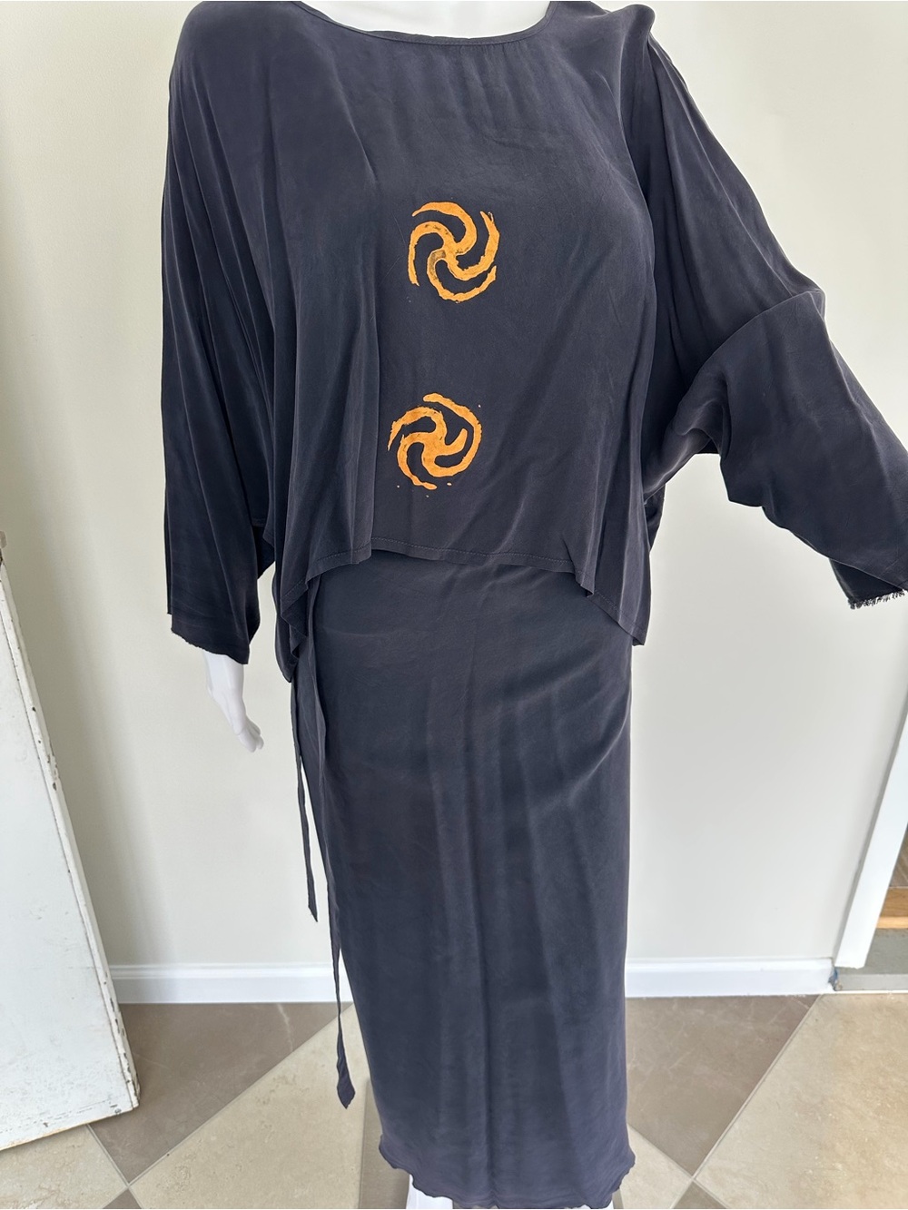 Black Women's Two-Piece Skirt Set with Orange Accent